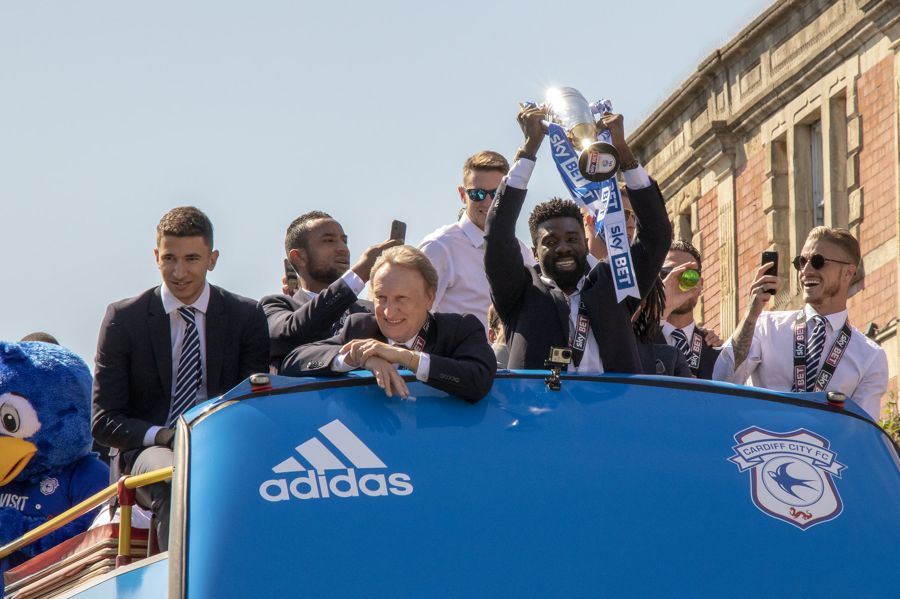 Neil Warnock riding Cardiff City bus after being promoted