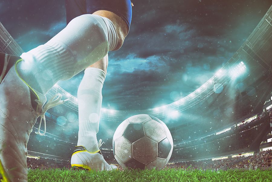 Footballer with Blue Kit and White Socks Close Up