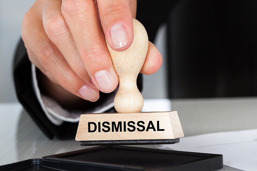 Businessman with Dismissal Stamp